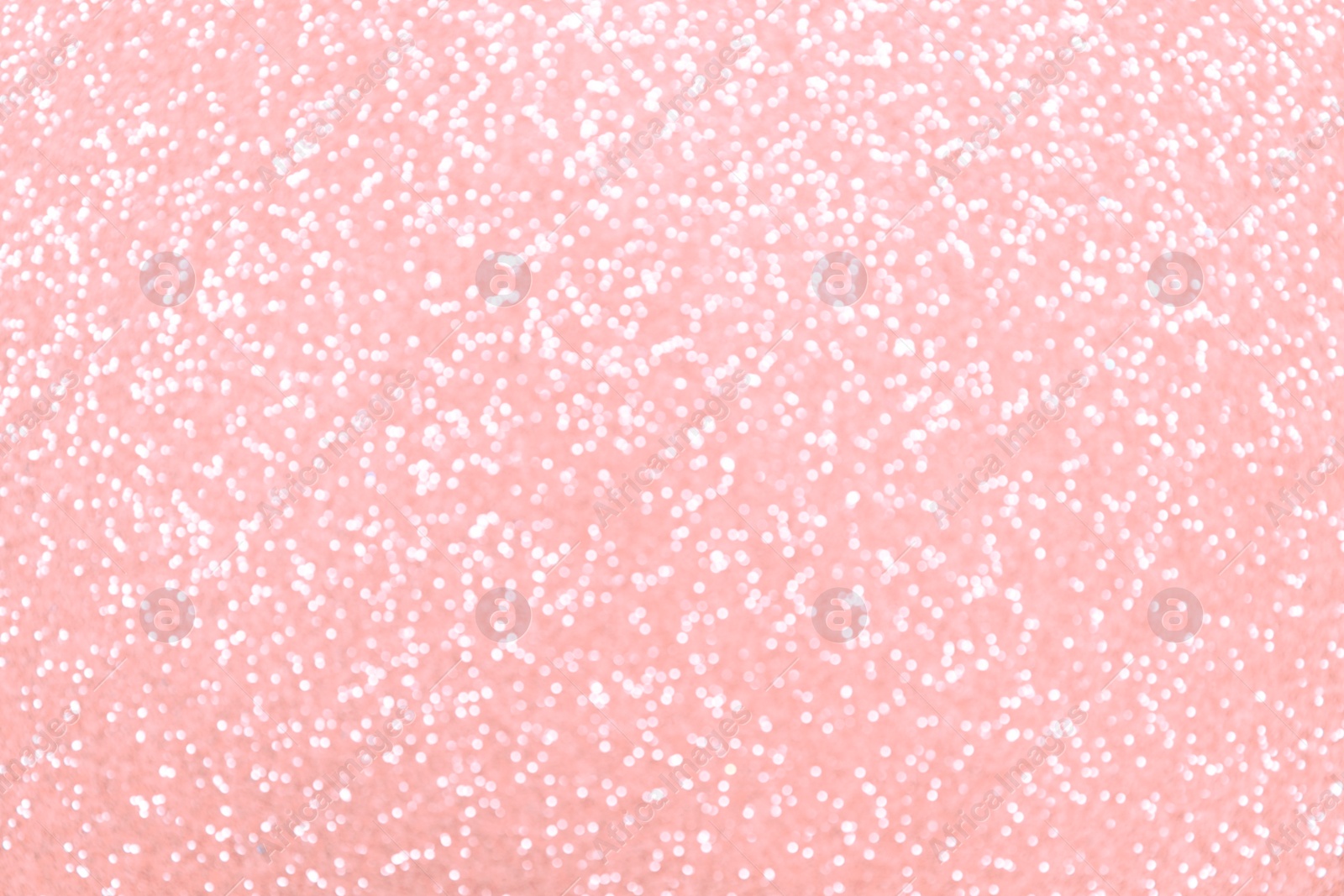 Photo of Beautiful pink shiny glitter as background, top view