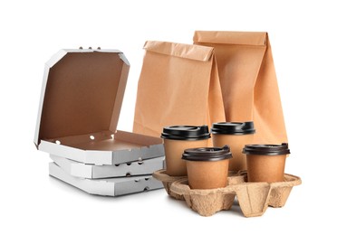 Image of Set with cardboard pizza boxes, takeaway cups and paper bags on white background