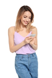 Young woman using phone on white background