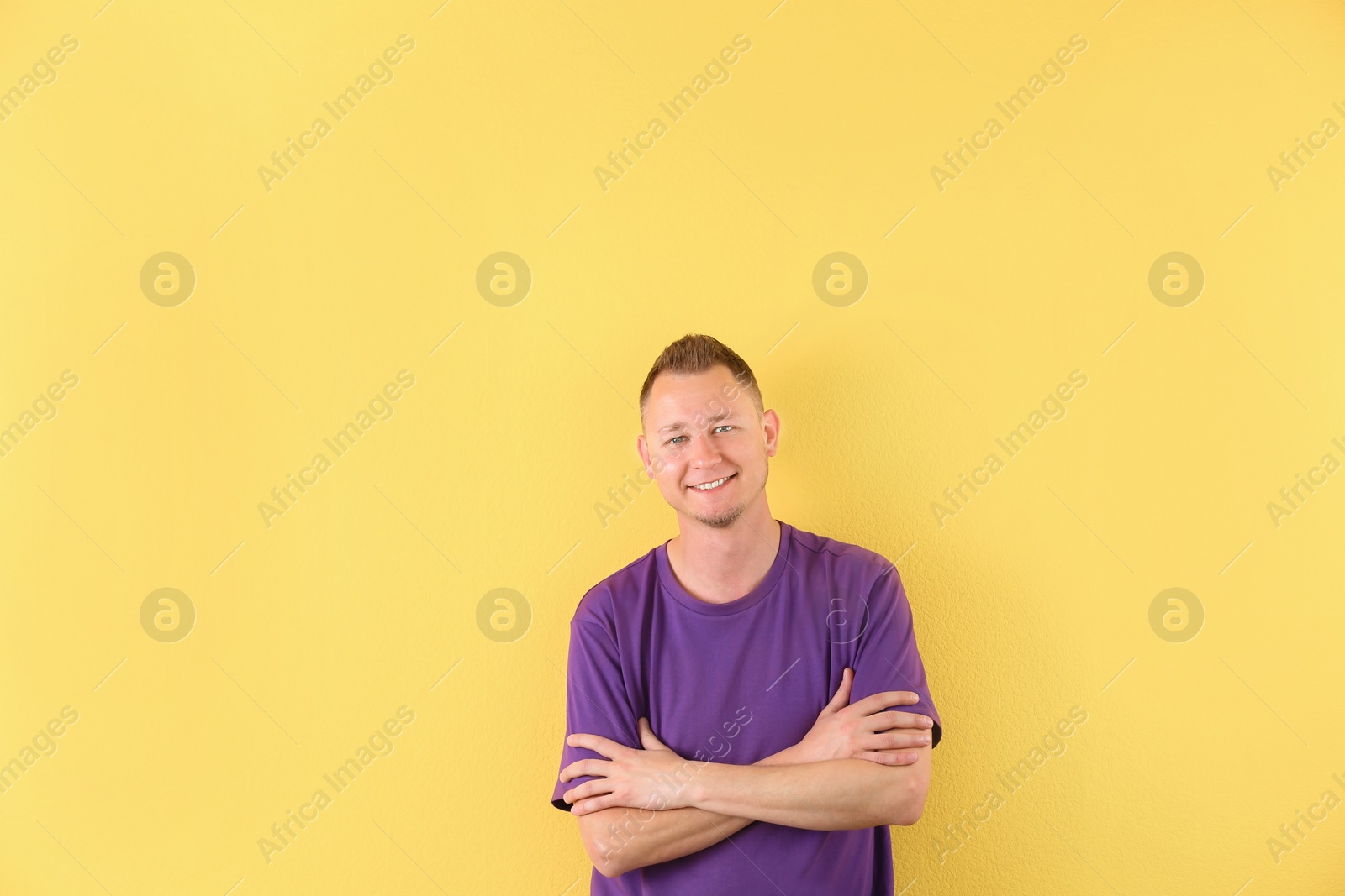 Photo of Portrait of handsome man on color background