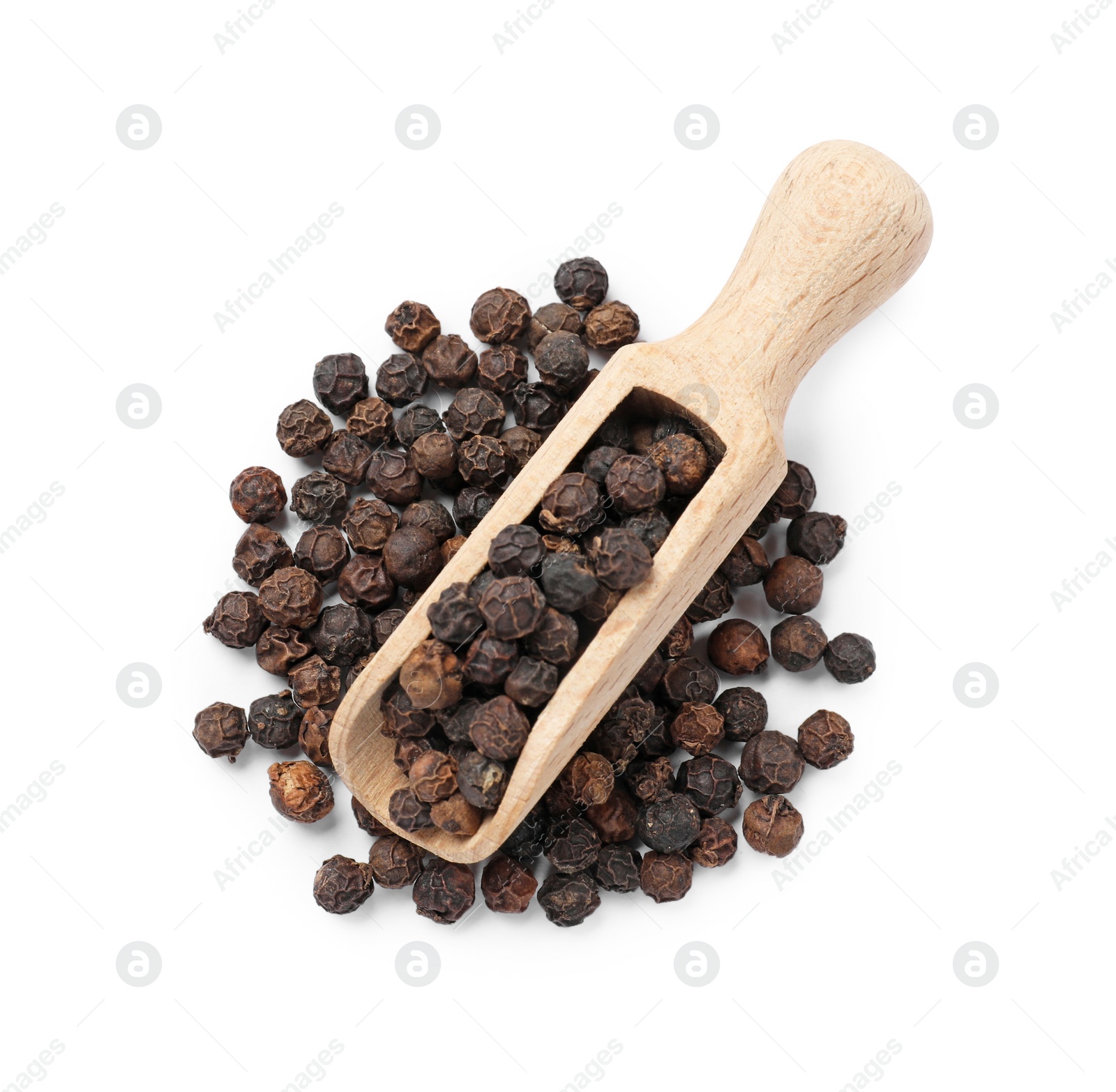 Photo of Aromatic spice. Many black peppercorns in scoop isolated on white, top view