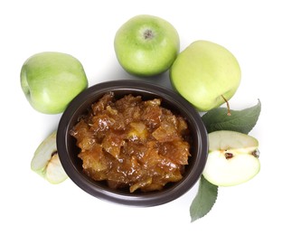 Photo of Bowl of delicious apple jam and fresh fruits isolated on white, top view