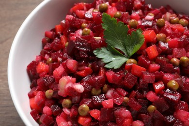 Photo of Delicious fresh vinaigrette salad in bowl, closeup