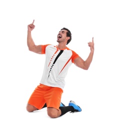 Photo of Young football player celebrating scoring of goal on white background