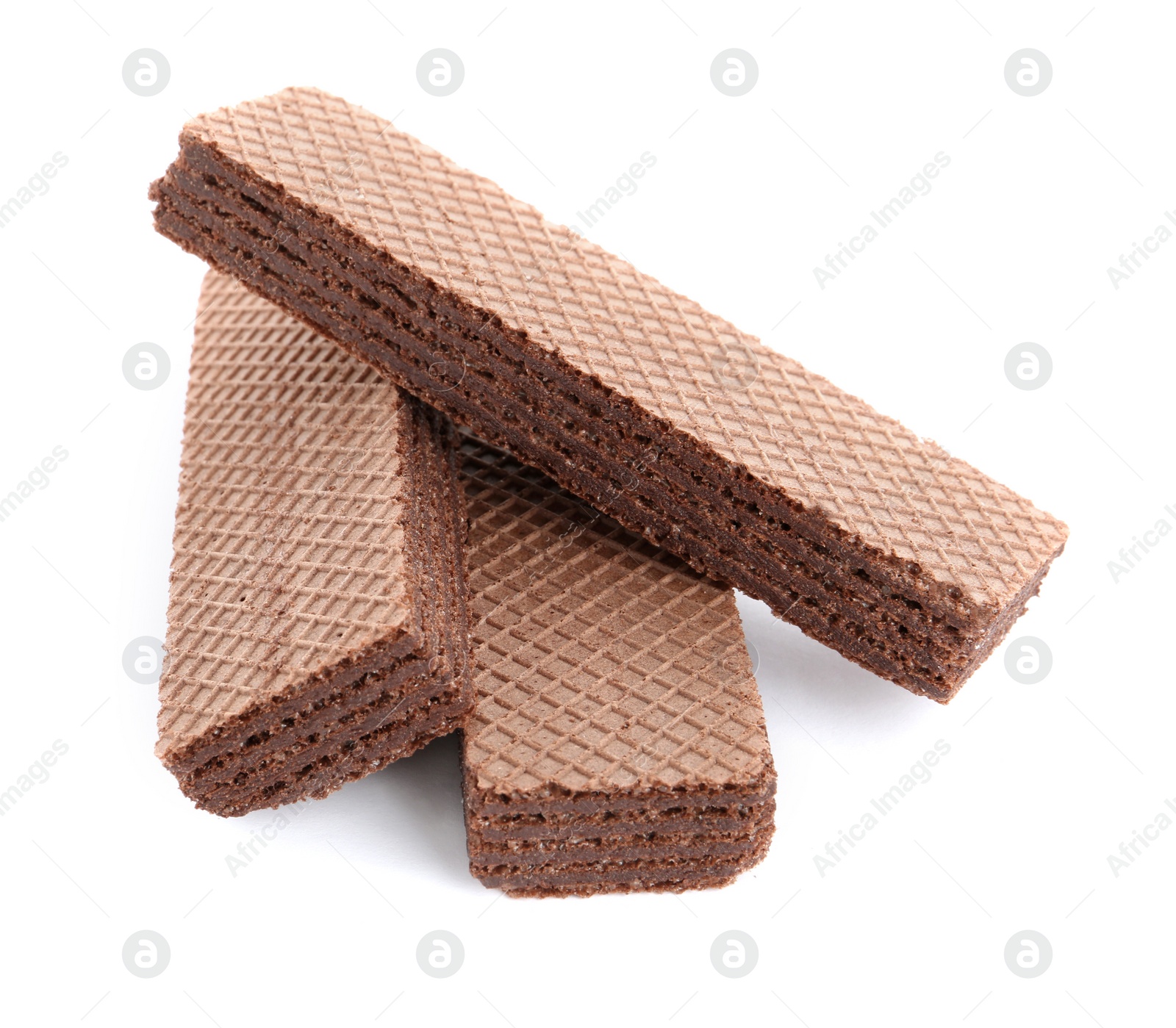 Photo of Delicious crispy wafers on white background. Sweet food