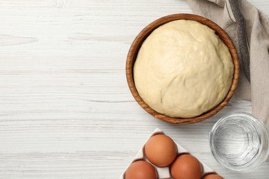 Photo of Cooking scones with soda water. Dough and ingredients on white wooden table, flat lay. Space for text