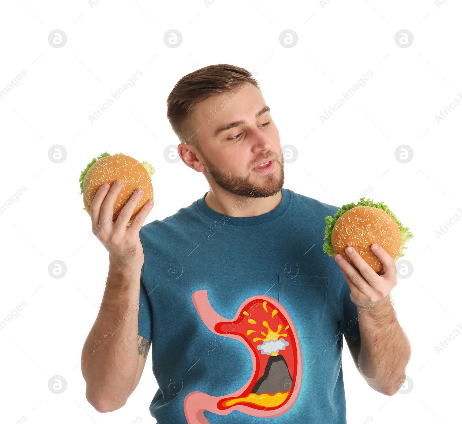Image of Improper nutrition can lead to heartburn or other gastrointestinal problems. Man with burgers on white background. Illustration of stomach with erupting volcano as acid indigestion