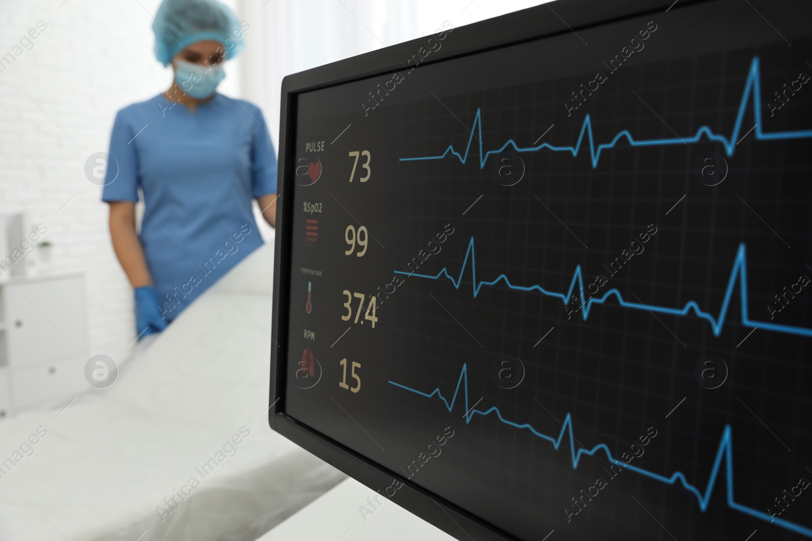 Photo of Monitor with cardiogram in hospital, focus on screen