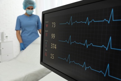 Photo of Monitor with cardiogram in hospital, focus on screen