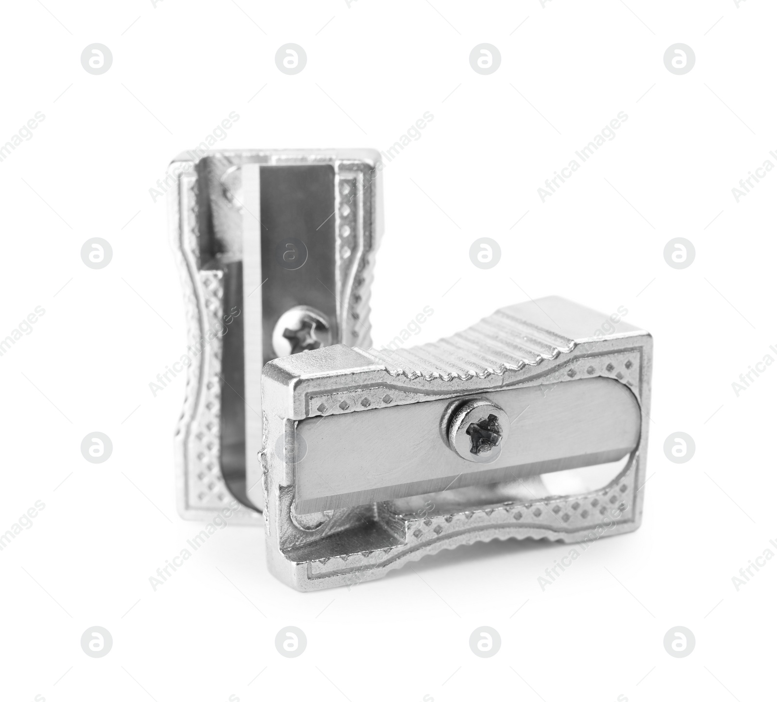 Photo of Shiny metal pencil sharpeners isolated on white