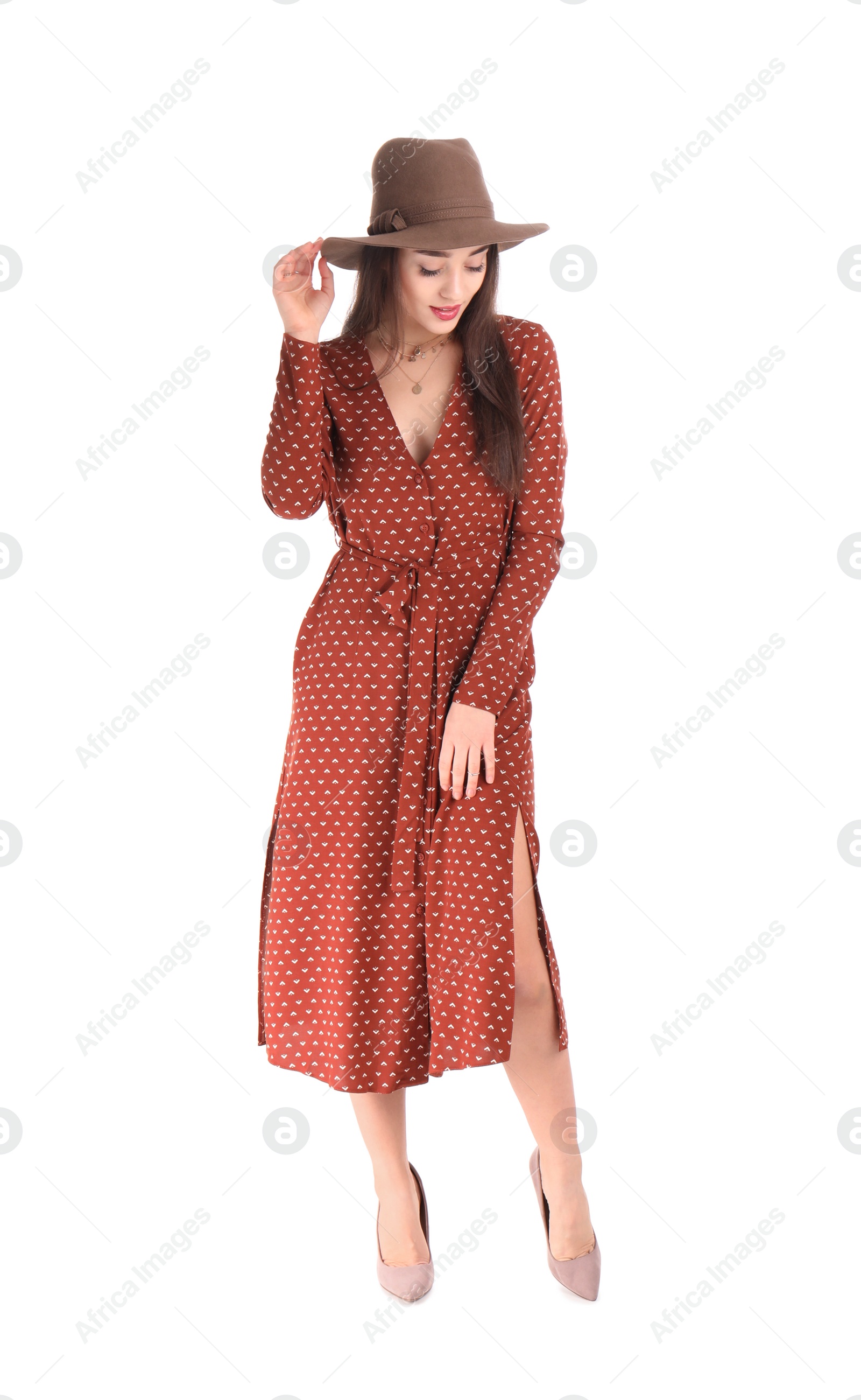 Photo of Portrait of beautiful young woman in stylish dress on white background