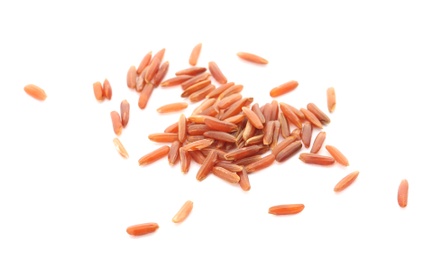 Photo of Uncooked red rice on white background. Healthy diet