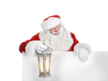 Authentic Santa Claus with blank poster and lantern on white background