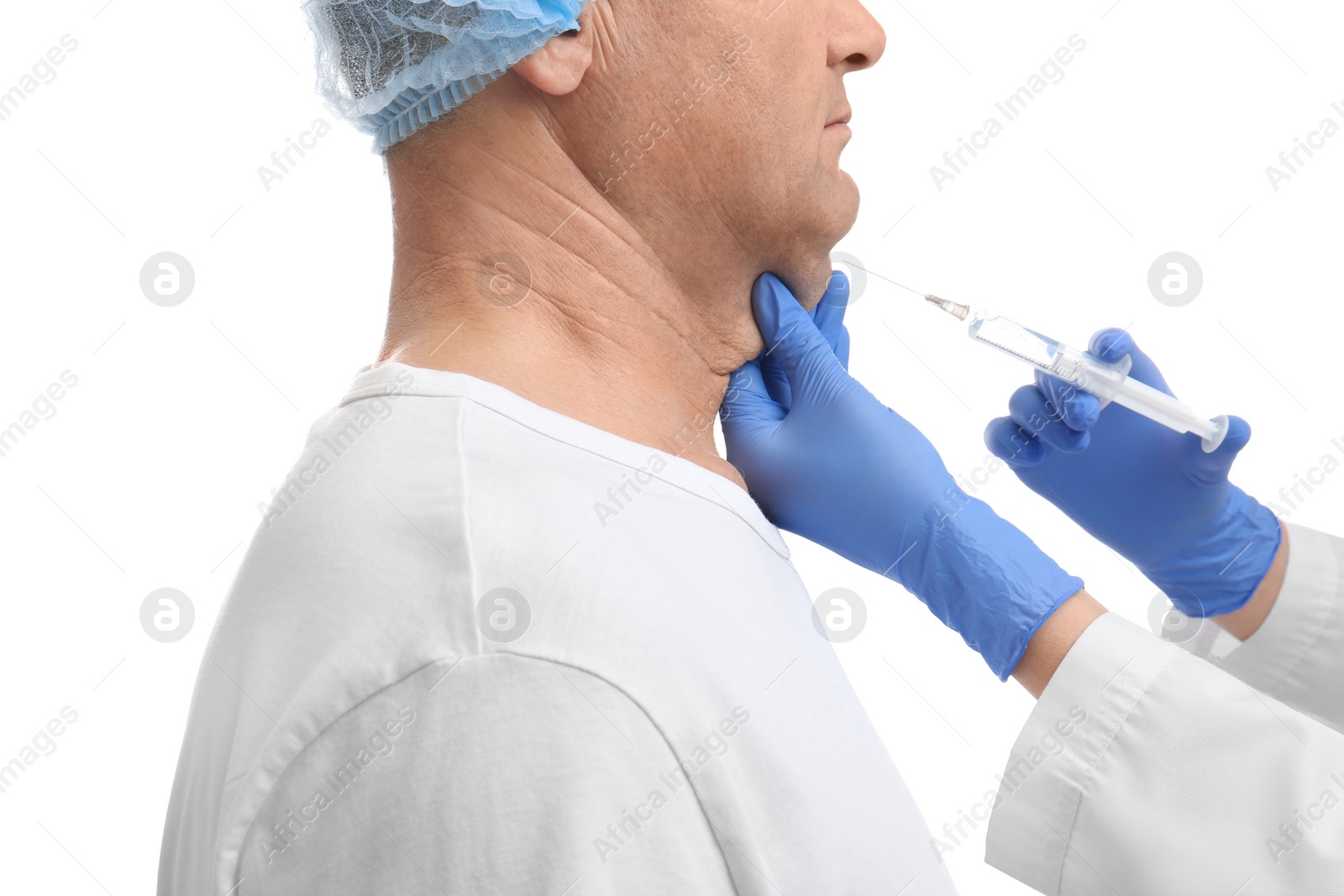 Photo of Mature man with double chin receiving injection on white background, closeup