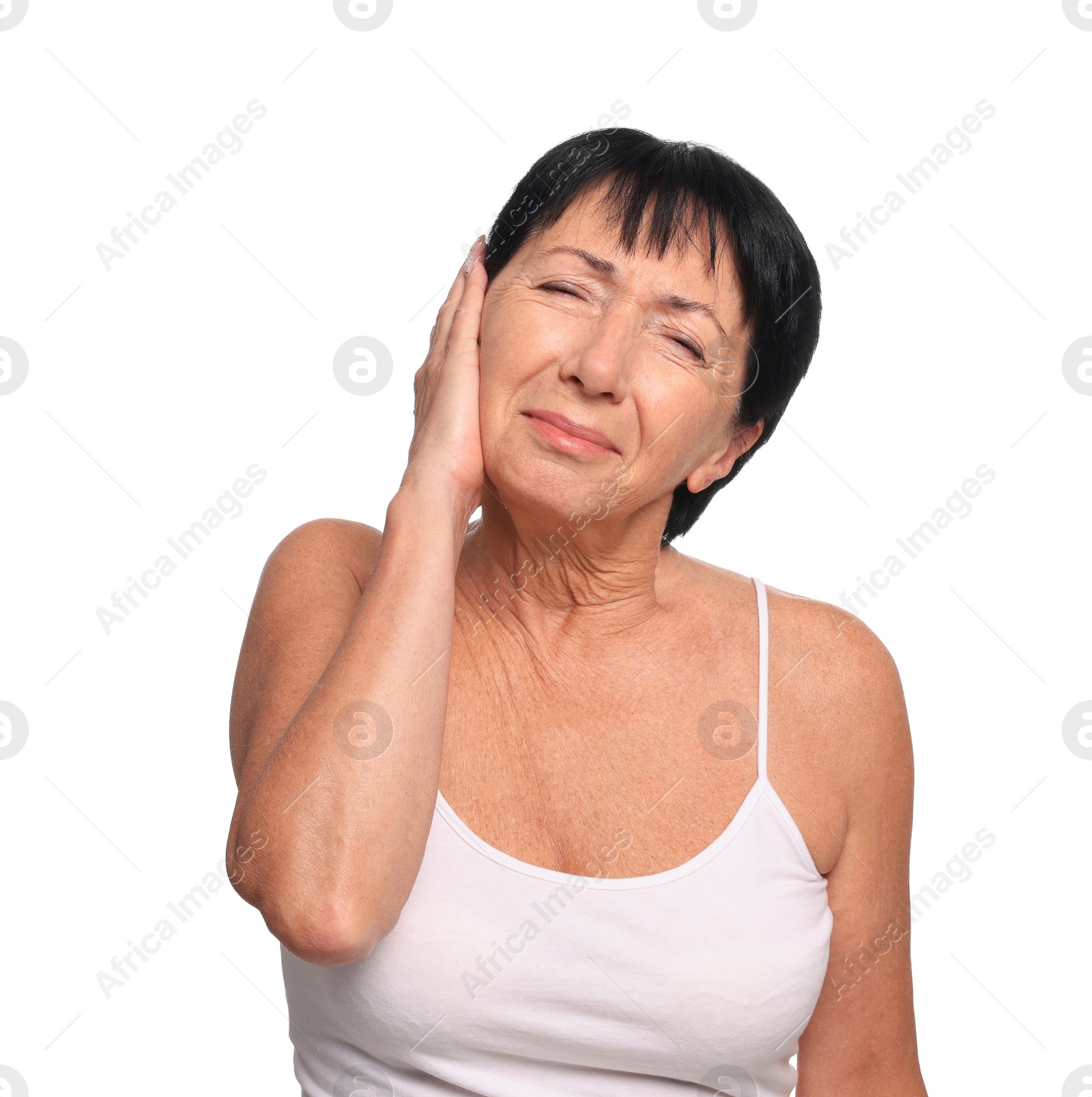 Photo of Senior woman suffering from ear pain on white background