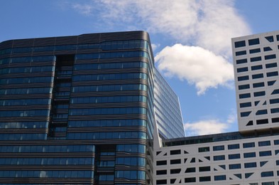 Photo of View of beautiful modern building in city against blue sky