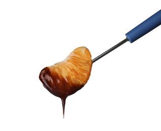 Fork with tangerine segment dipped into chocolate fondue on white background