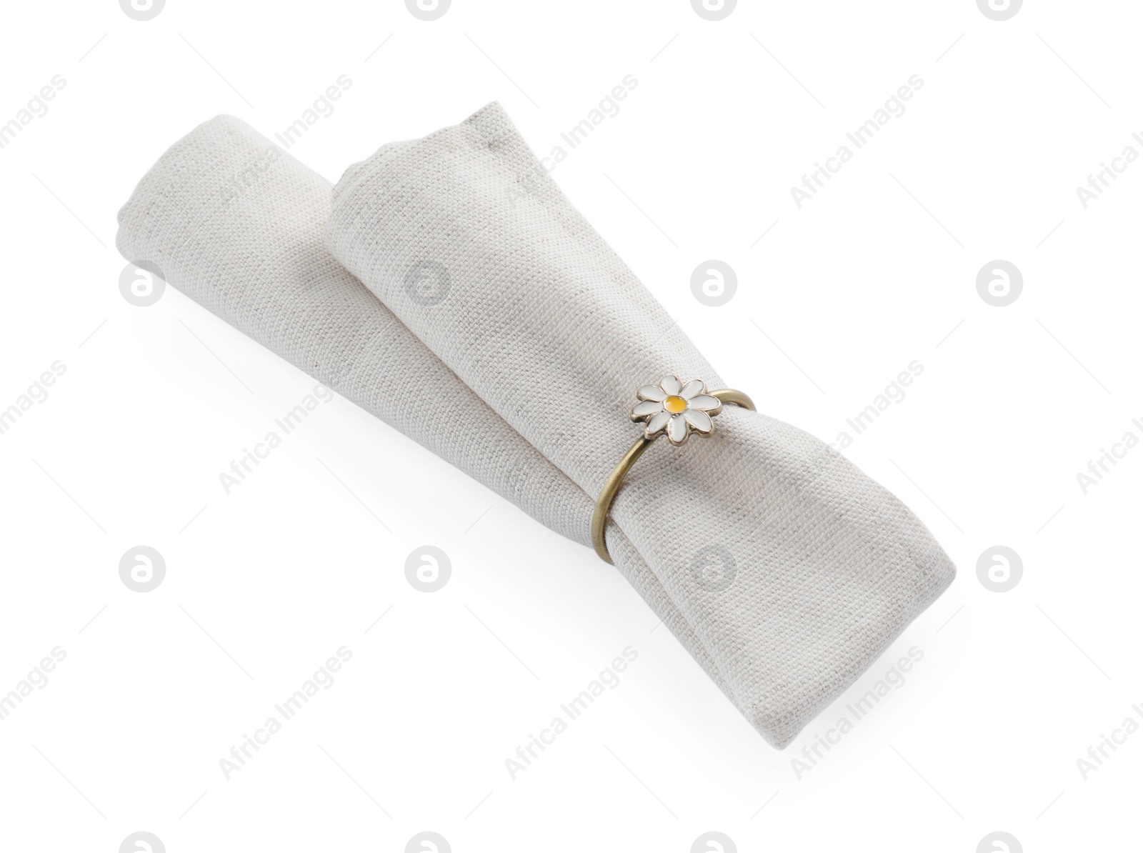 Photo of Napkin with decorative ring for table setting isolated on white