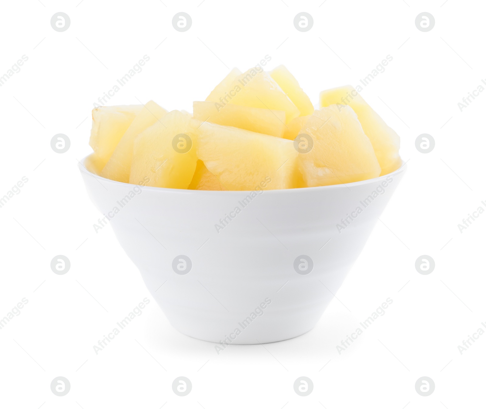 Photo of Pieces of delicious canned pineapple in bowl on white background