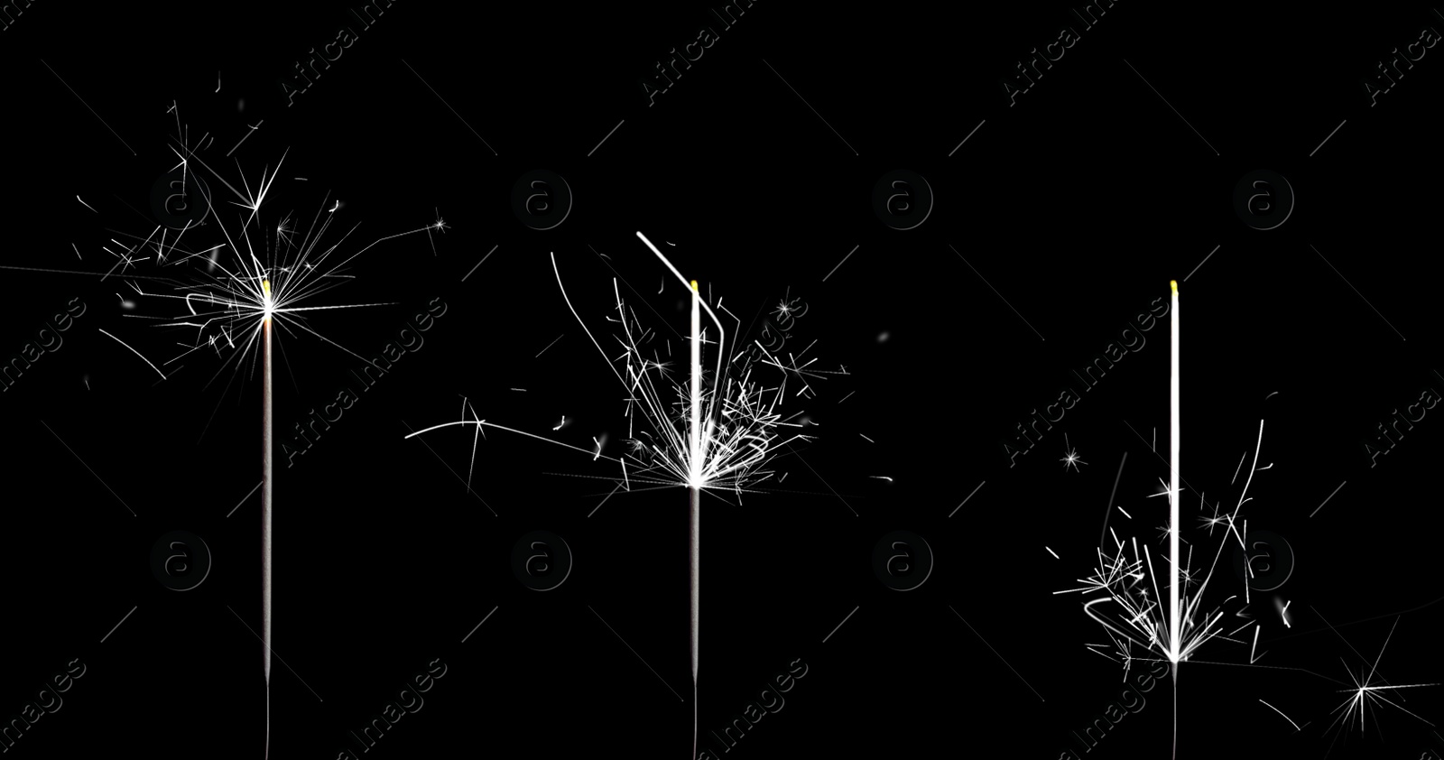 Image of Set of burning sparklers on black background. Banner design