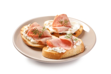 Photo of Plate of tasty bruschettas with ham on white background