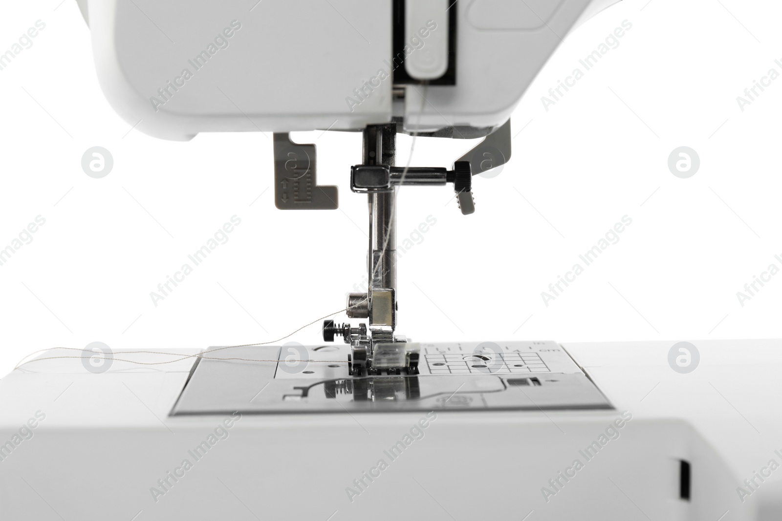 Photo of One modern sewing machine isolated on white