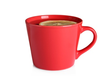 Cup of hot tea with lemon on white background