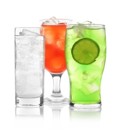 Photo of Delicious refreshing drinks in glasses on white background