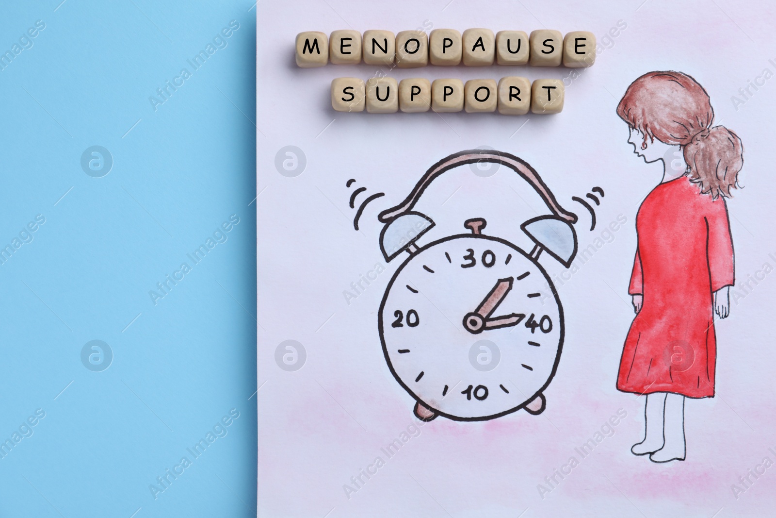 Photo of Drawing of woman figure near alarm clock and wooden cubes with words Menopause Symptoms on light blue background, top view