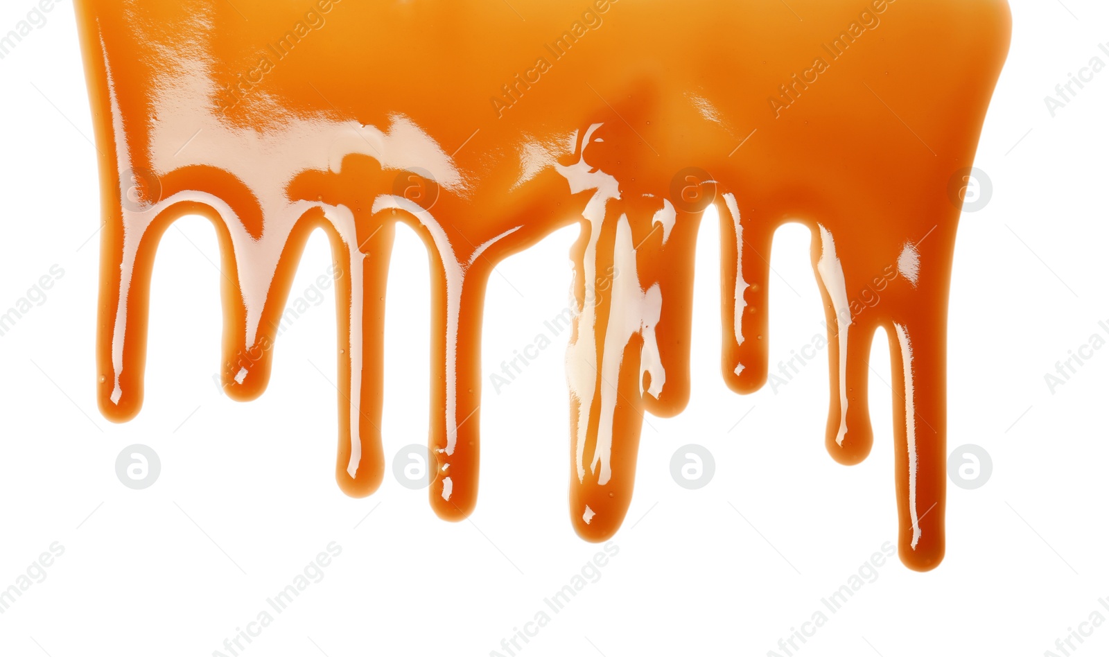 Photo of Delicious caramel sauce on white background