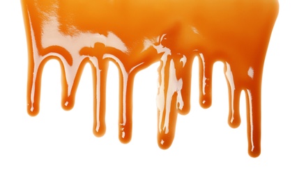 Photo of Delicious caramel sauce on white background