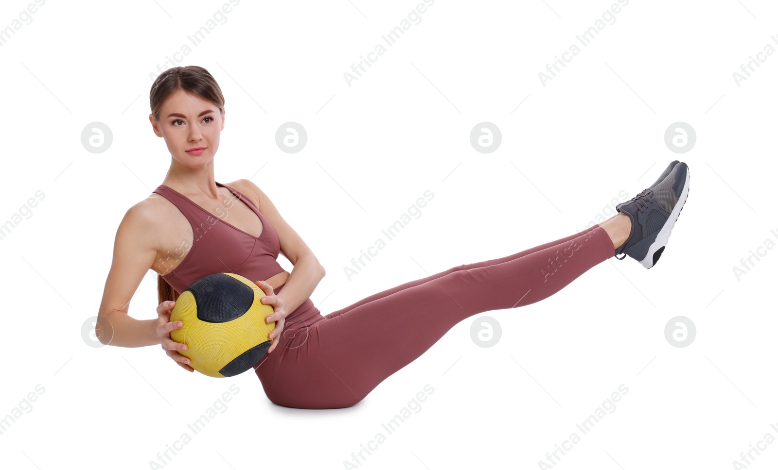 Photo of Athletic woman doing exercise with medicine ball isolated on white