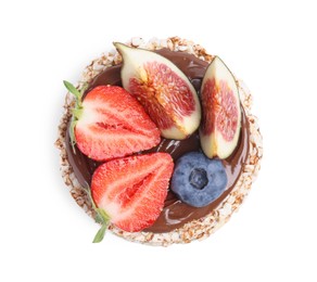 Photo of Tasty crispbreads with chocolate, berries and figs on white background, top view
