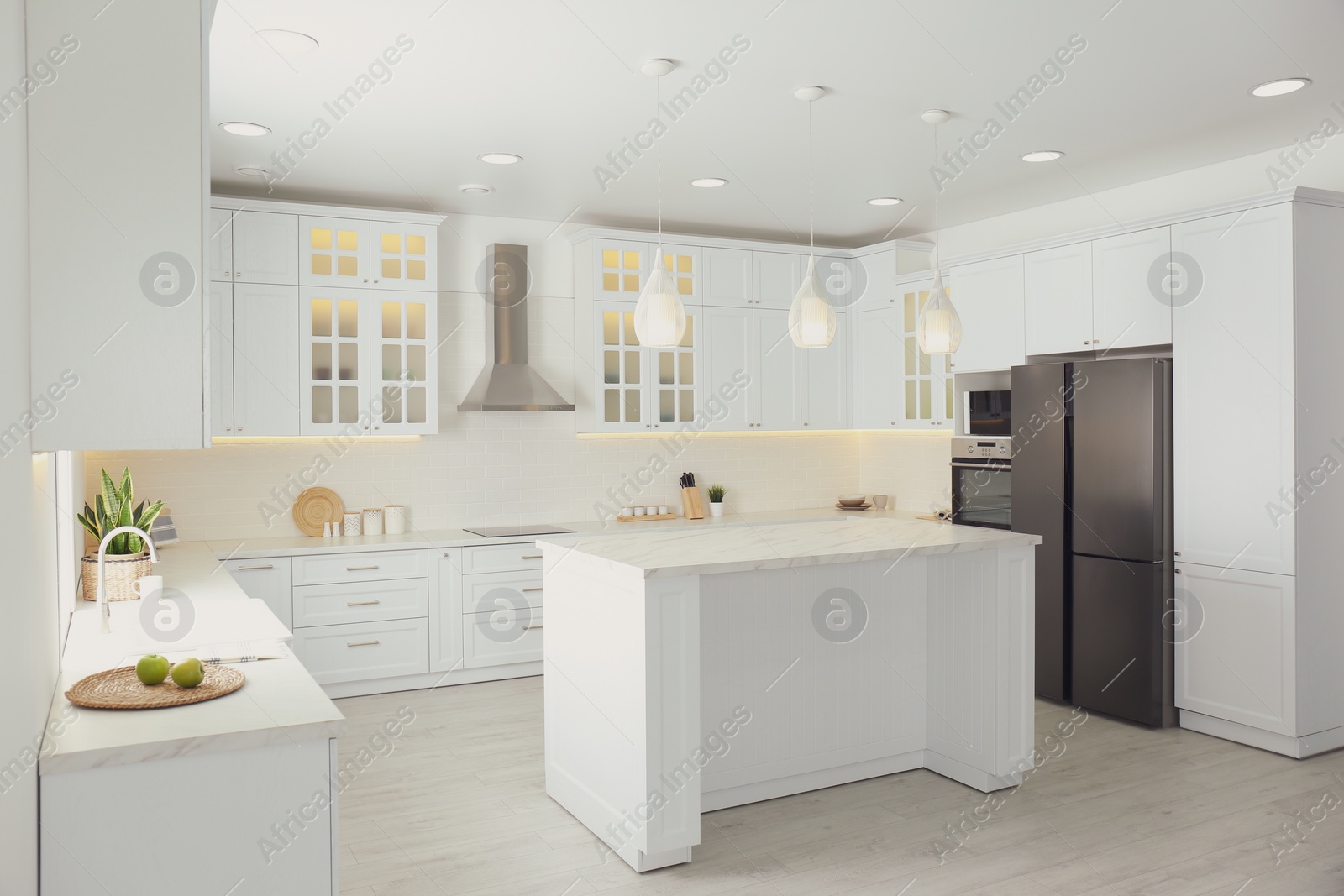 Photo of Beautiful kitchen interior with new stylish furniture