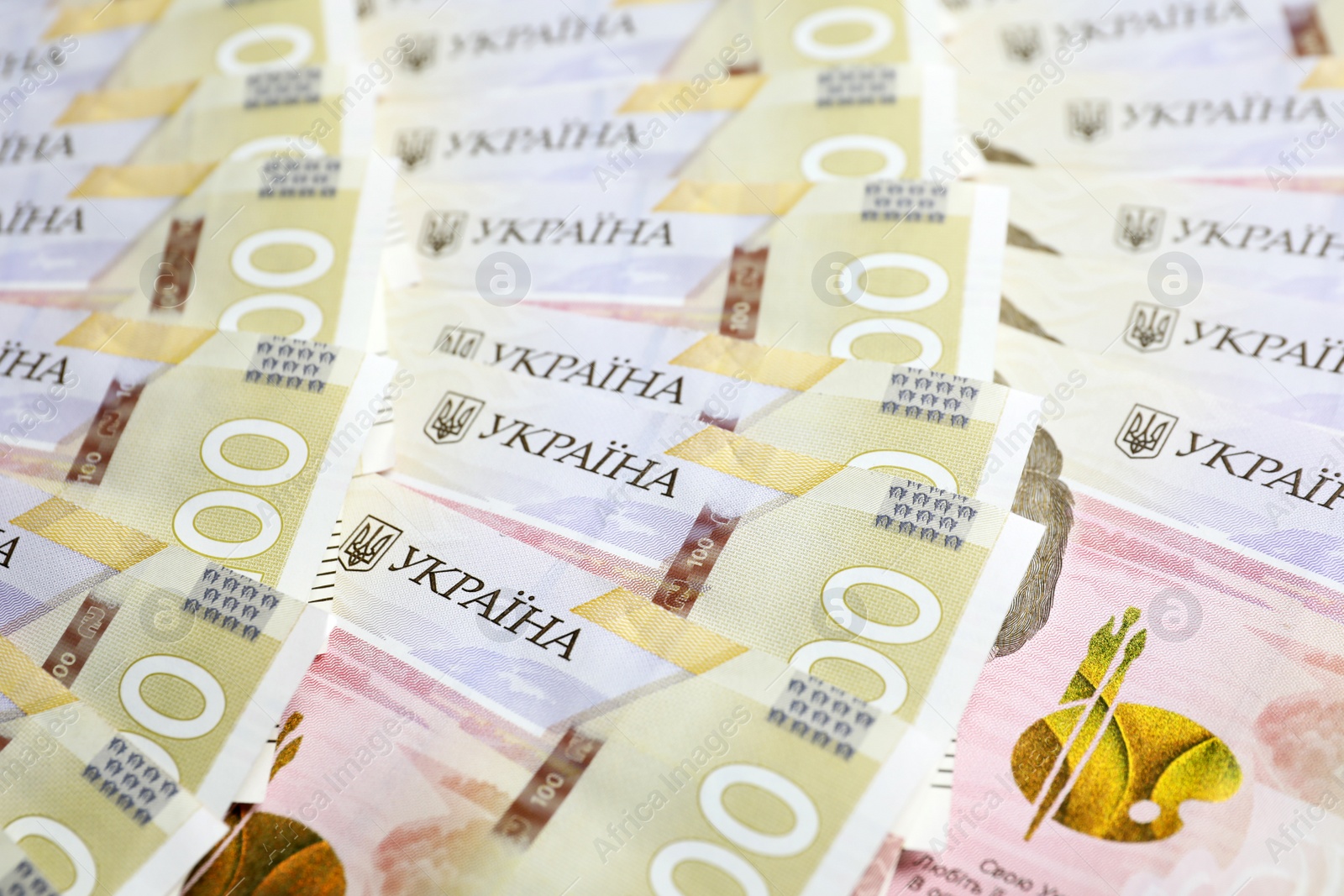 Photo of Closeup view of Ukrainian money as background. National currency