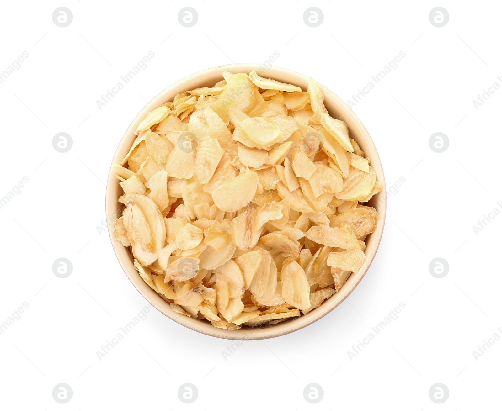 Photo of Dried garlic flakes in bowl on white background, top view