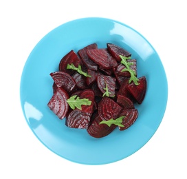 Plate with roasted beetroot slices and arugula isolated on white, top view