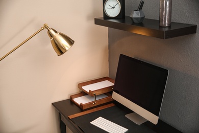 Modern interior of working place with computer