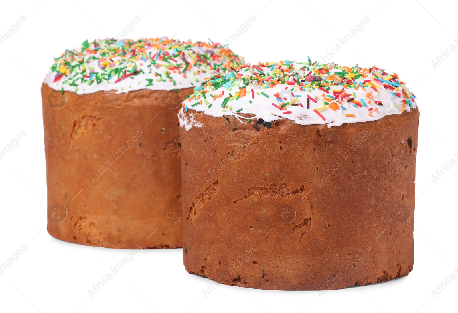 Photo of Traditional Easter cakes with sprinkles isolated on white