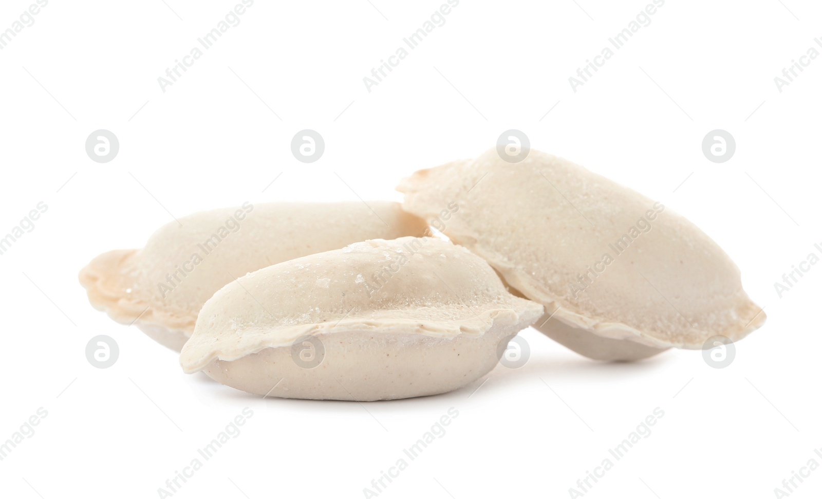 Photo of Raw dumplings with tasty filling on white background