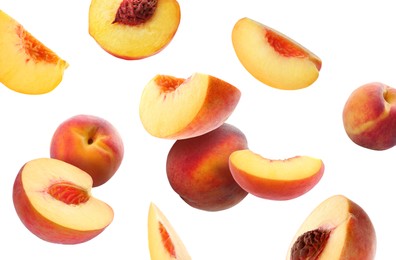 Image of Juicy fresh peaches falling on white background