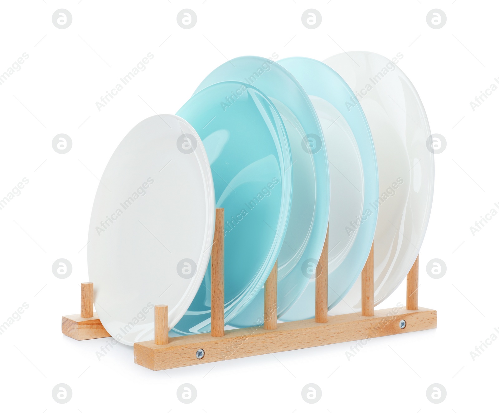 Photo of Rack with clean dishes on white background