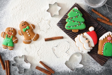 Photo of Flat lay composition with delicious homemade Christmas cookies on grey table