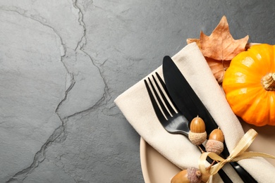 Photo of Festive table setting on grey background, top view with space for text. Thanksgiving Day