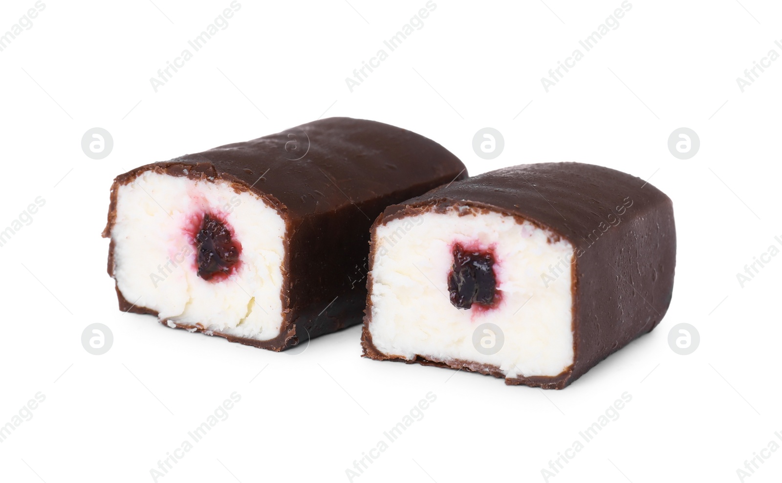 Photo of Cut glazed curds with berry filling isolated on white