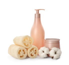 Photo of Set of toiletries with natural loofah sponges on white background