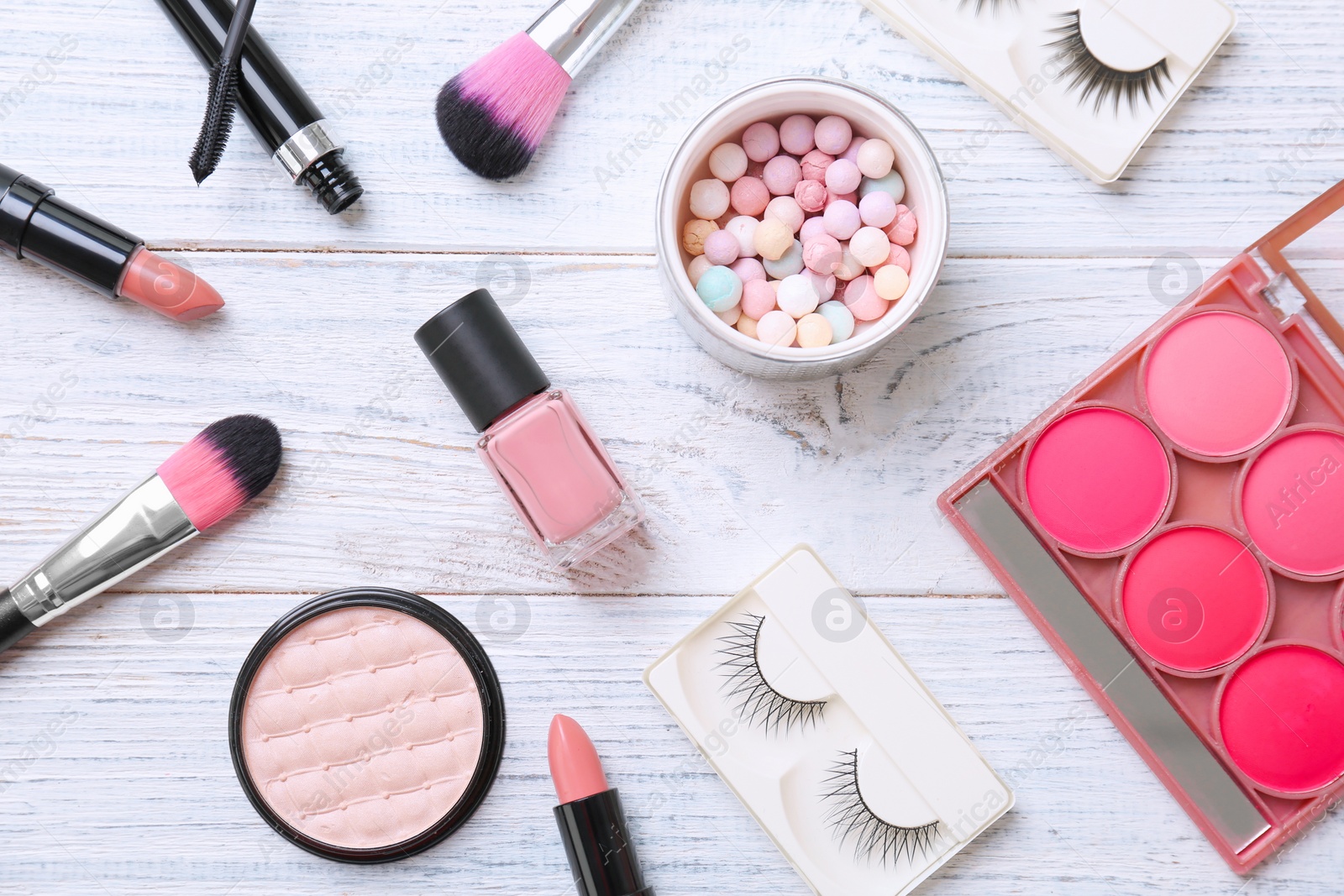 Photo of Flat lay composition with cosmetic products on wooden background
