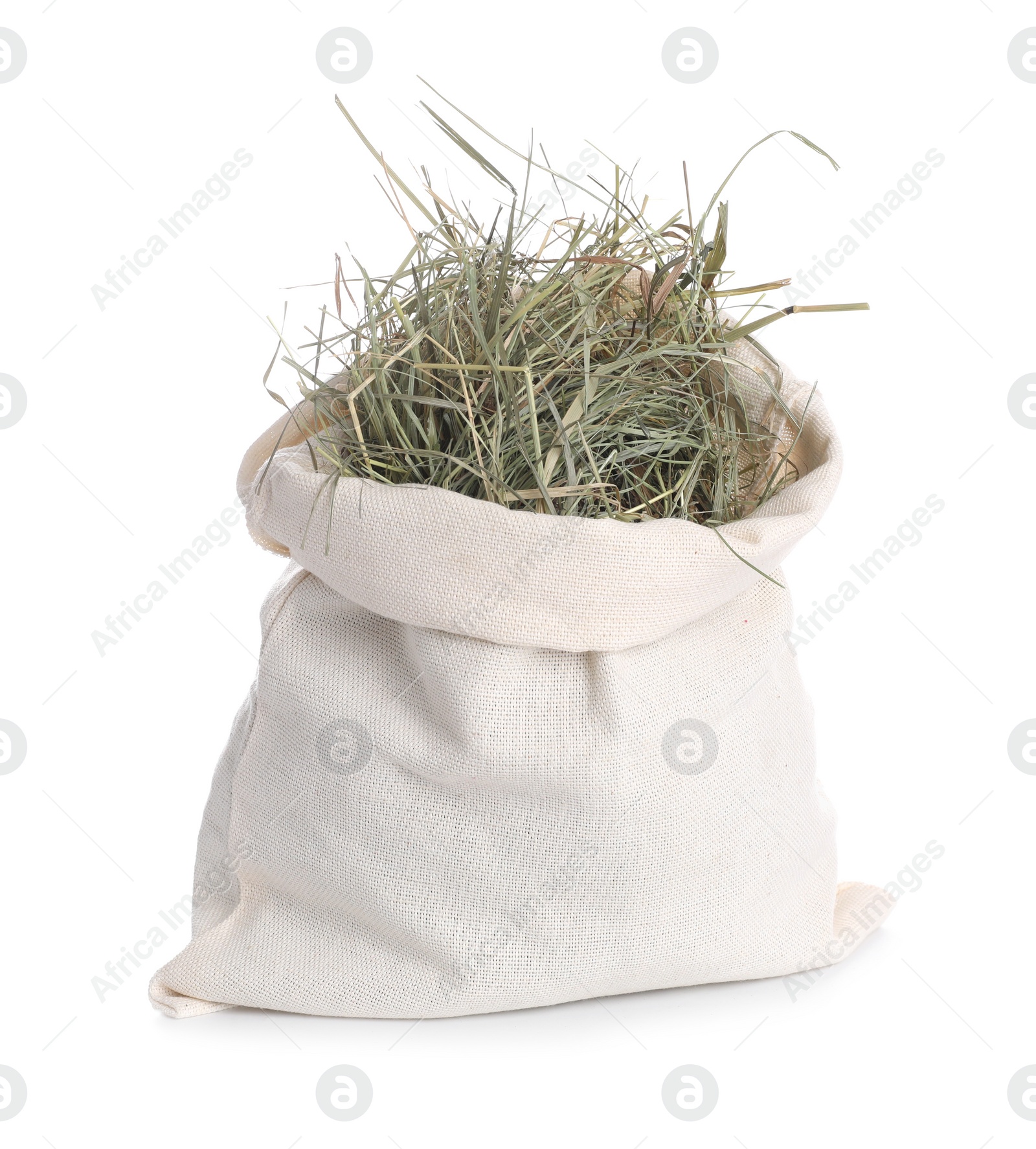 Photo of Dried hay in burlap sack isolated on white