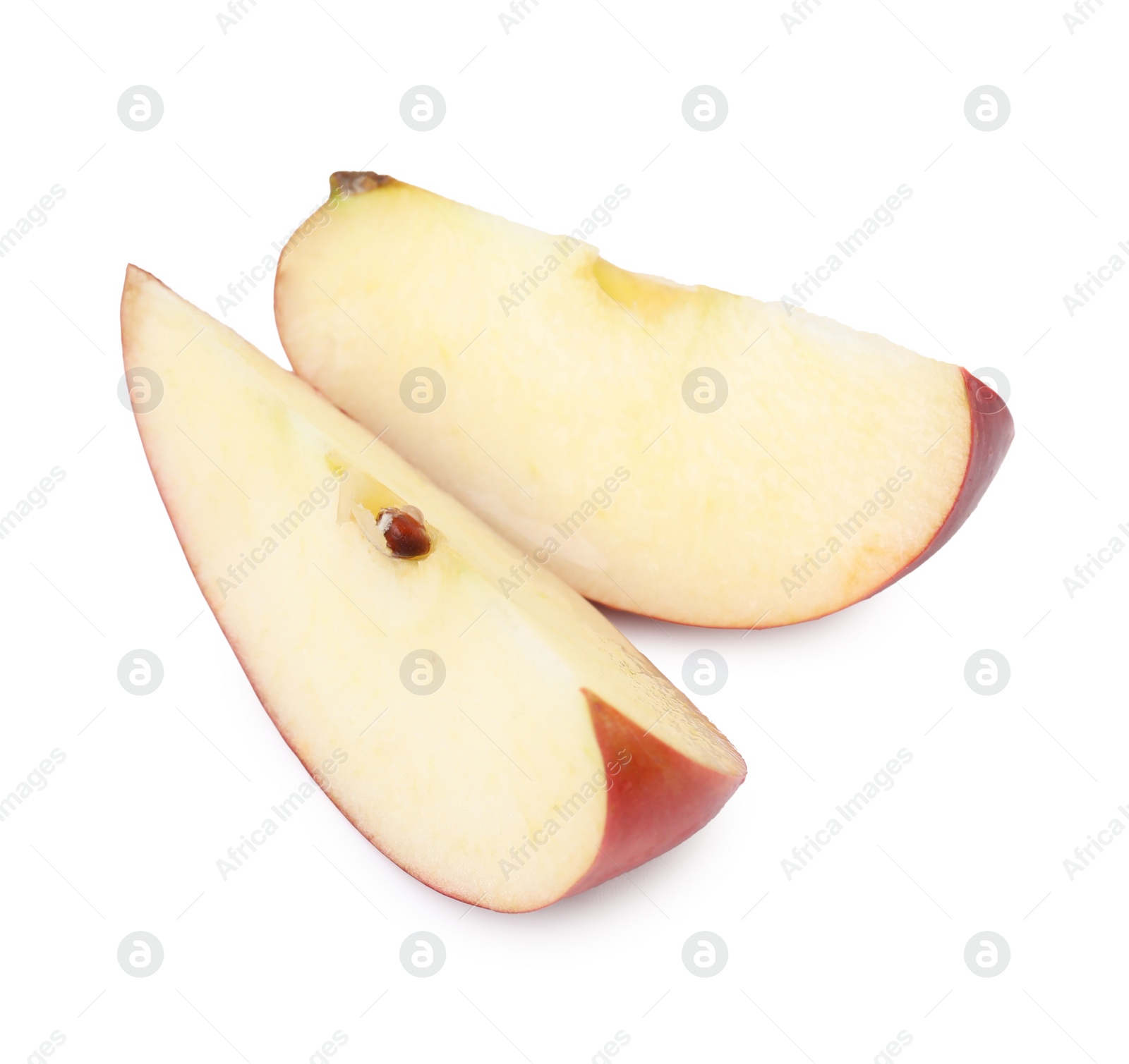 Photo of Slices of ripe red apple isolated on white