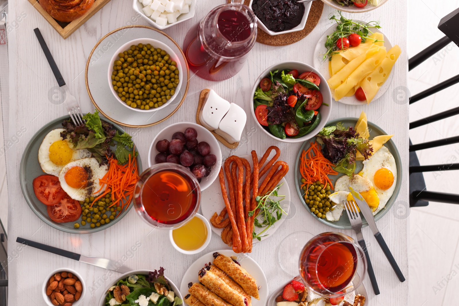 Photo of Many different dishes served on buffet table for brunch, flat lay